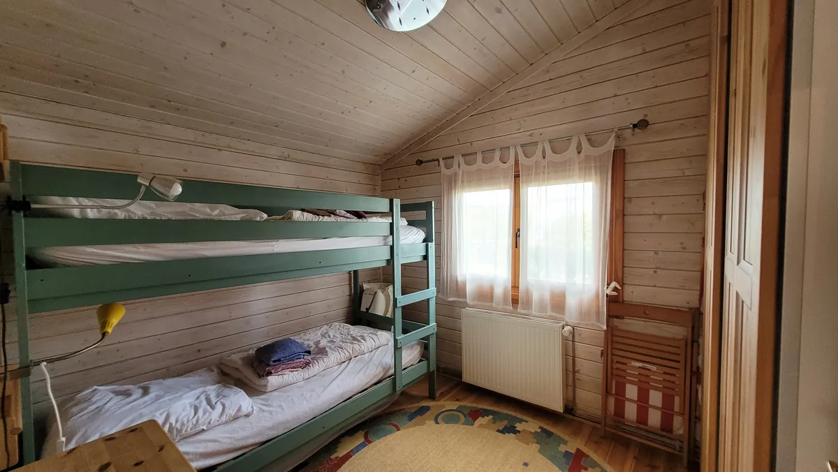 Schlafzimmer mit Etagenbett im Ferienhaus Heiterkite